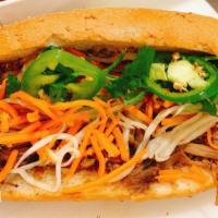 Banh Mi Pork · Shredded with pickle papayas and carrots, cilantro, jalapeno. Add extra meat for an addition...
