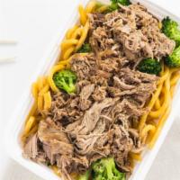 Pork Yakisoba Noodle Bowl · Our Locally made yakisoba noodles and veggies sauteed in our TLG house sauce topped with you...