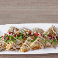 Quesadilla Ala Minute · Your choice of Chicken Tinga, Pulled Pork or Fire Roasted Corn and Nopales with a Sharp Ched...
