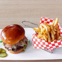 The Chef’S Choice Burger · Our signature patty blackened and smothered with house made brown sugar bacon jam, cheddar c...