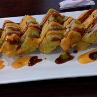 Chef'S Special Roll · Salmon, tuna, avocado, crab meat with special sauce.