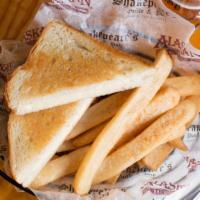 Grilled Cheese · American and cheddar cheese melted to perfection on your choice of sourdough or wheat bread.
