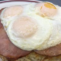 Olympian Breakfast · Special. A local favorite! Hash browns topped with layers of swiss and American cheese, two ...