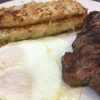 Steak & Eggs · 10 oz. tender New York strip and two eggs served with hash browns and toast or pancakes or F...