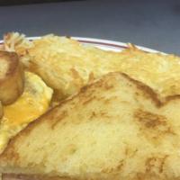 Breakfast Sandwich · Two eggs and slice of swiss or American cheese with choice of bacon sausage or ham. Served w...