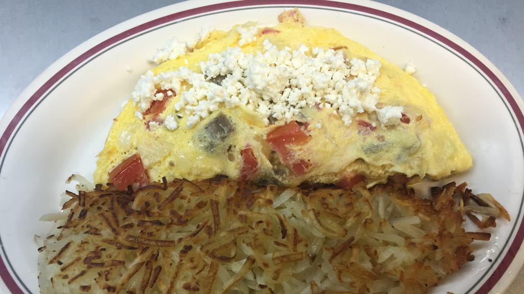 Greek Omelet · Special. Omelet filled with feta cheese, tomatoes, onions, and choice of bacon or gyro meat.