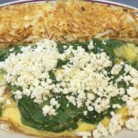 Spinach Omelet · Three egg omelette served with tomatoes bacon and spinach with feta cheese.