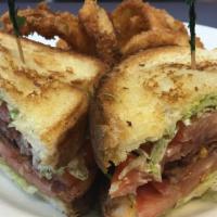 Blt · Bacon, lettuce, and tomato piled high on Texas toast.