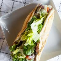 Gyro Sandwich · Lamb, chicken or beefteki served in pita bread with lettuce, tomato, onions, and cucumber sa...