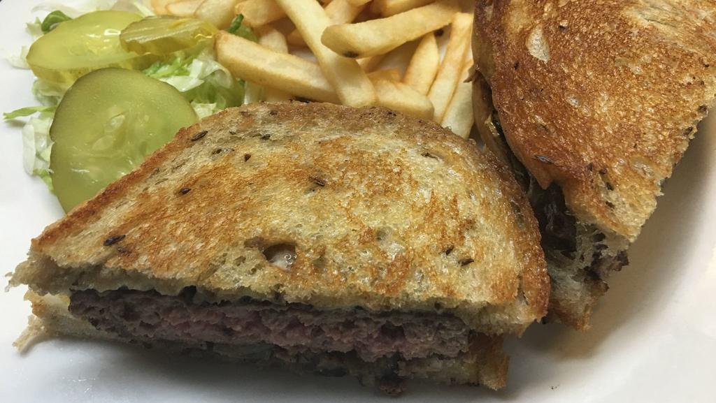 1/2 Pound Patty Melt · Beef patty on rye bread with Swiss cheese and grilled onions.