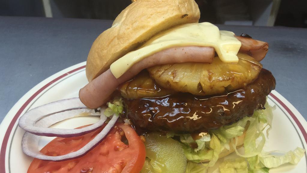 The Hawaiian · 1/2 lb. ground beef patty, topped with two slices ham, swiss cheese, pineapple and teriyaki sauce.