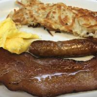 Kid'S Breakfast · Served with one bacon slice, one sausage link, one egg, and hash browns.