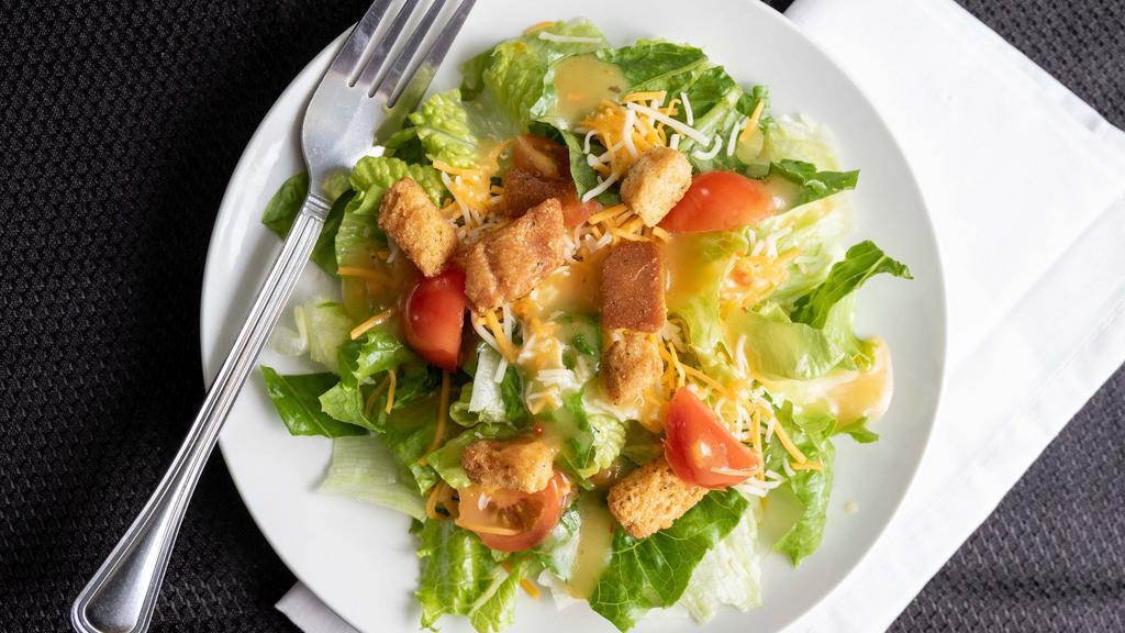 House Salad · Add grilled or fried chicken for an additional charge.