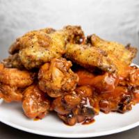 6 Wings · Bone in wings tossed with flavor of your choice.  Garlic,  Lemon Pepper, Honey BBQ, Buffalo,...