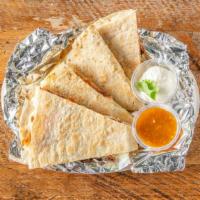 Kimchi Quesadilla With Meat · Choice of protein.