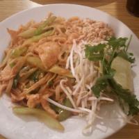 Pad Thai · Favorite Dishes. Classic Thai wok stir-fry with rice noodles in a chili sauce with green oni...