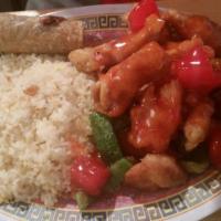 Sweet And Sour Chicken · Wok tossed chicken with Cantonese sweet and sour sauce and green and red bell pepper.