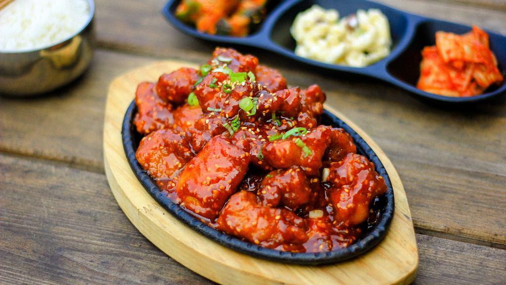 Dak Gang-Jung · Sweet and spicy glazed boneless fried chicken. (Also available mild).