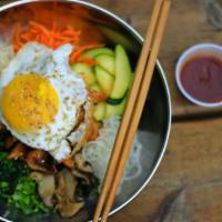 Bibimbap Bar · Choice of chicken, beef, or tofu with fried egg served with a medley of veggies over rice an...