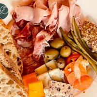 Charcuterie Board · House made salumi chef's choice of artisanal cheeses