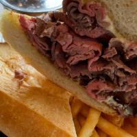 French Dip · Rotisserie roasted prime rib, shaved and loaded onto a LoDough hoagie for au jus dipping