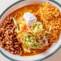 Enchiladas Especiales · Two enchiladas in our classic peanut-based sauce topped with melted cheese, lettuce, tomato,...