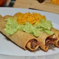 3 Rolled Tacos  · With Guacamole