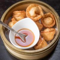 Crab Delight (8 Pieces) · Deep fried wonton soup stuffed with imitation crab meat and cream cheese. Served with sweet ...