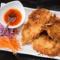 Coconut Prawns (5 Pieces) · Marinated and dusted with sweet coconut flake and fried.