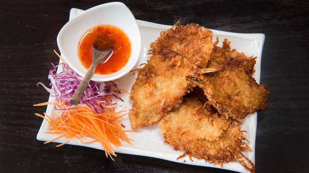 Coconut Prawns (5 Pieces) · Marinated and dusted with sweet coconut flake and fried.