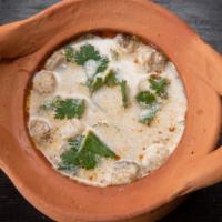 Tom Kha · Hot & sour soup with coconut milk, mushroom, lemon grass galangal, kaffir lime leave & cilan...