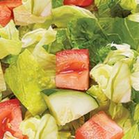 Chopped House  · diced cucumbers, tomatoes, garlic focaccia and croutons on a bed of mixed greens. served wit...