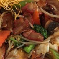 Cantonese Chow Mein · Shrimp, BBQ pork, chicken, broccoli, bean sprouts, snow peas, carrots and mushrooms in a bro...