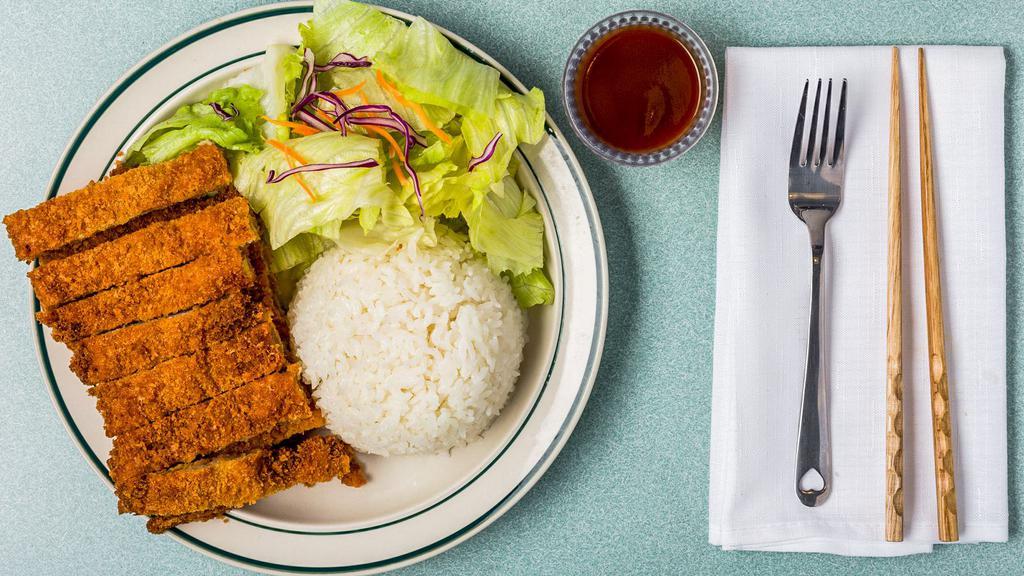 Chicken Katsu · Served with salad and steamed rice.