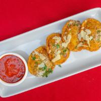 Ravioli Fritti · Meat ravioli lightly breaded and flash fried with Maria's marinara sauce.