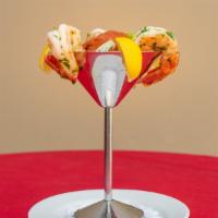 Shrimp Cocktail · Jumbo chilled prawns with homemade cocktail sauce and lemon.