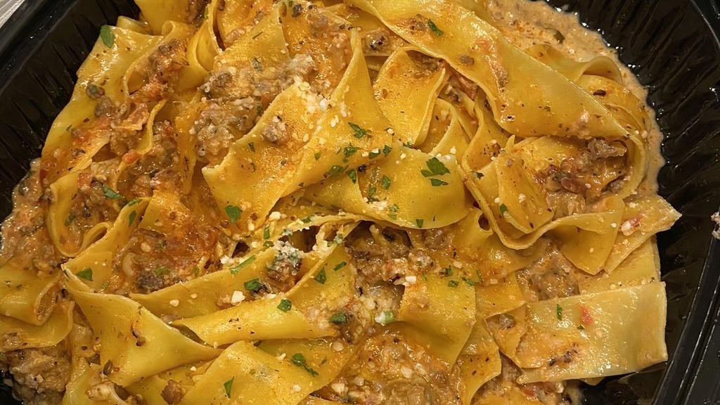 Pappardelle Bolognese · Imported ribbon egg pasta with Maria's bolognese meat sauce.