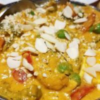 Navaratna Korma · Mixed vegetables cooked with nuts and an onion-based creamy sauce.