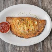 Little Italy Calzone · Ricotta and Mozzarella cheeses with Pepperoni and sausage.