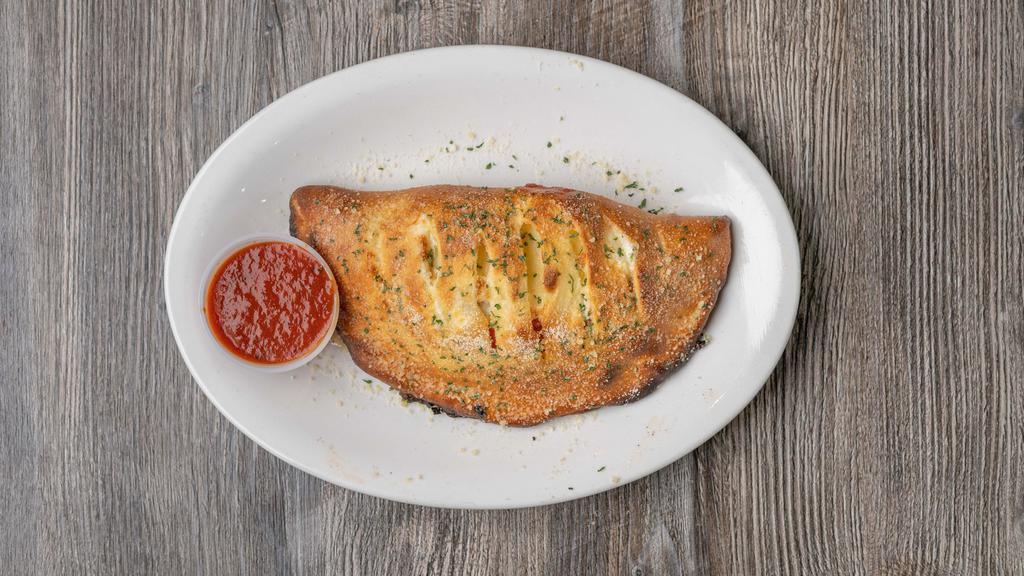 Little Italy Calzone · Ricotta and Mozzarella cheeses with Pepperoni and sausage.