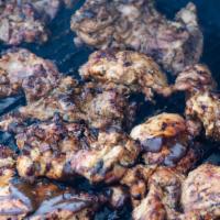 Grilled Jerk Chicken Thighs · (2) Famous grilled chicken thighs seasoned to perfection and sauced.