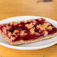 Raspberry Oat Bar · Raspberry jam, oats, flour and butter. Simple yet very satisfying.