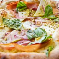 Pera Pizza · Olive oil base, garlic, five cheeses, red onion, sliced pears, prosciutto, pistachios and ba...