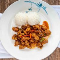 Orange​ ​Chicken · Mild spicy. Comes​ ​with steamed​ ​rice​ ​and​ ​salad.