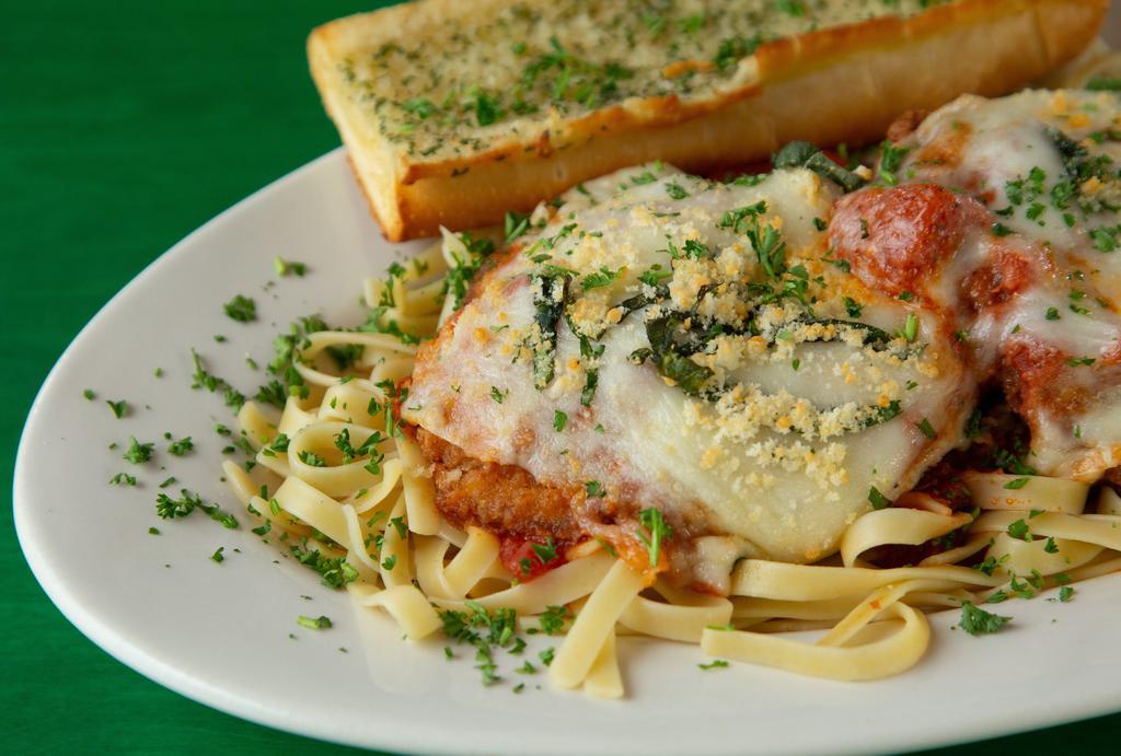 Jumbo Chick Parm · Huge all natural chicken breast served on a bed of fettuccine and topped with our homemade marinara, provolone and our four cheese blend.
