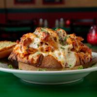 Zany Ziti · Ziti pasta, meat sauce and four Italian cheeses are topped with Wisconsin cheese, baked in a...