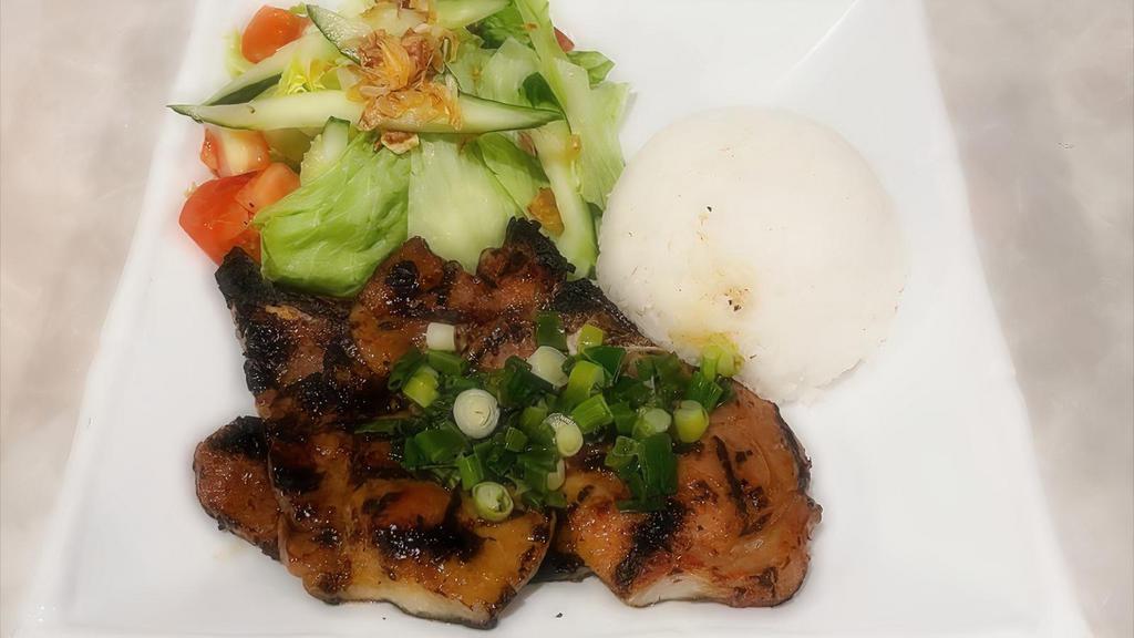 Pork Chop Rice Dish · Grilled pork chops served with a side of fresh salad. Can add fried egg to any dish for an additional price.