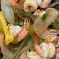 Fajitas De Camaron · Shrimp with red and green peppers.