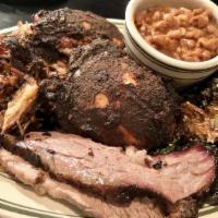 Smokehouse Combo Plate · USDA Prime grade brisket, pulled pork and a choice of 2 house sides.