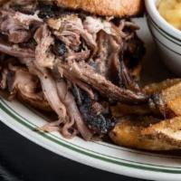 Pulled Pork · Smoked 14 hours, served with your choice of 2 sides.
